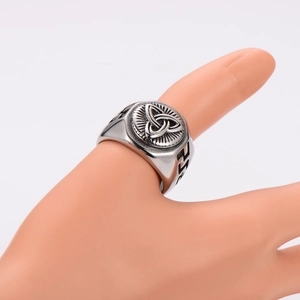 Macro shot of silver Celtic Knot signet ring in retro 304 stainless steel for men