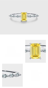 Macro shot of S925 sterling silver ring with emerald-cut yellow zircon and pave setting