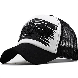 Detail of New York embroidered mesh trucker hat with American flag graphic and curved brim
