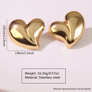 Macro detail of chunky gold stainless steel heart earrings with dimensions and weight info