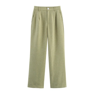 Detail of light green linen blend trousers with high waist, button and pleats