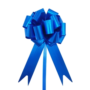 Close-up of blue 3D pull bow for gift wrapping with shiny metallic finish on white background