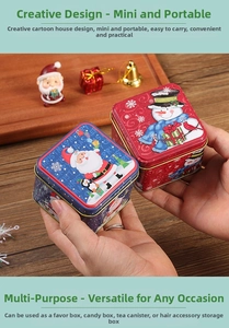 Close-up of portable square Christmas tin box with festive Santa Claus and snowman prints