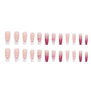 Pink French ombre press-on nails with butterfly charms and glitter in long ballet shape