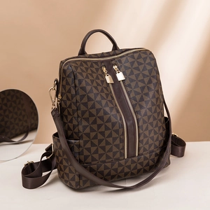 Brown geometric print backpack with gold zippers shown in a professional front view