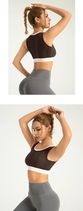 Close-up of contrast binding on high-impact sports bra and high-waist yoga leggings