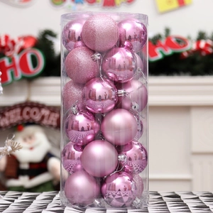 Pink Christmas ball ornament set with shiny and matte finishes in a clear storage tube
