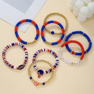 Detail view of American football polymer clay bracelets with helmet charms and beads