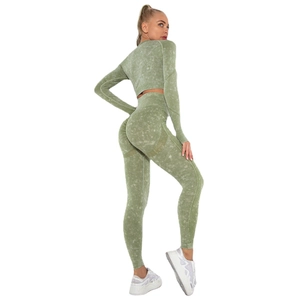 Women's seamless acid wash yoga set featuring long sleeve crop top and leggings