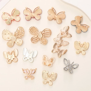 Mix of gold and silver diamond-studded butterfly charms for DIY jewelry and phone cases