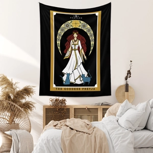Detail of Bohemian Freyja goddess tapestry in a cozy bedroom with warm lighting
