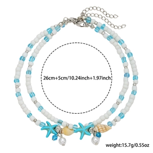 Double-layer beach anklet with blue starfish, white shells, and size details