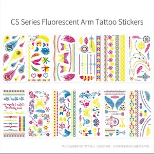 Set of 12 fluorescent temporary tattoos featuring feathers and flowers for UV parties