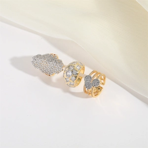 Three-piece gold adjustable open rings set with sparkling clear cubic zirconia stones