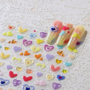 3D colorful heart nail art stickers with various sizes for vibrant manicure decoration