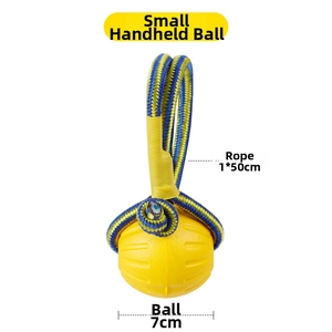 Close-up of a 7cm yellow dog training ball with a 50cm durable braided rope handle