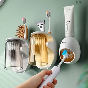 Organizer da bagno a parete con portaspazzolino e distributore automatico di dentifricio