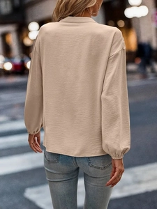 Elegant apricot long-sleeve shirt with lace stitching for women, back view street style