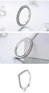 Macro detail of S925 sterling silver ring with pavé stones and heart hollow-out patterns