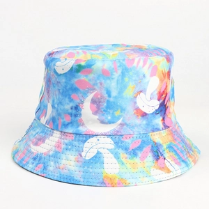 Close-up of colorful tie-dye bucket hat with moon and mushroom patterns