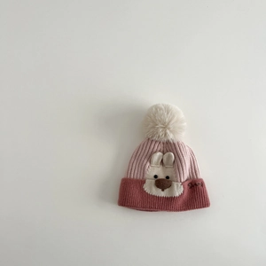 Detail of baby winter knit hat with pink拼接, white pompom and Sunny embroidery