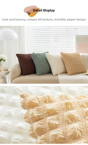 Detailed macro view of textured bubble fabric cushion cover with invisible zipper