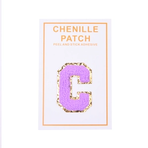 Detailed close-up of purple chenille letter C patch with golden sequins and adhesive back