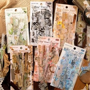 Detailed view of vintage themed scrapbooking sticker packs including 30 pieces per set