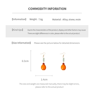 Detailed size and material information for orange Persimmon resin drop earrings
