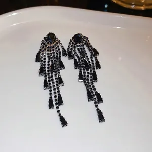 Long black cubic zirconia tassel earrings with silver needle and cascading metal chains