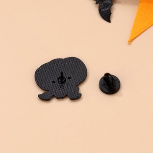 Detailed back view of Halloween enamel pin with secure black rubber clutch backing