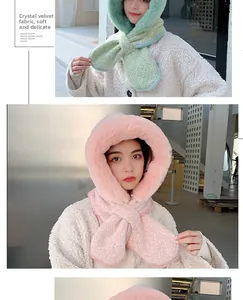 Detail of soft crystal velvet fabric and faux fur trim on hooded scarf in pink and green