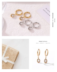 Close-up of gold and silver hoop earrings with clear waterdrop cubic zirconia charms