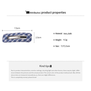 Detail view of 7.5cm blue checkered fabric hair clip showing exact size and weight