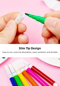 Detail of 6-color fine tip fiber markers for drawing and coloring with pink background