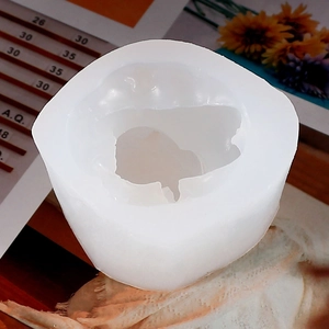 Close-up of translucent silicone mold for DIY unicorn aromatherapy candle and resin art