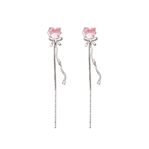 Silver bow tassel earrings with pink heart crystals and sparkling long chain dangles