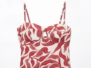 Detail of floral linen blend midi dress with sweetheart neckline and chest cutout design