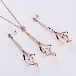 Elegant rose gold titanium steel jewelry set featuring drop earrings and a twisted necklace