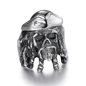 Macro shot of Viking skull ring featuring intricate beard braids and pirate hat details