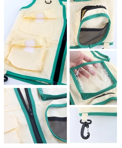 Detail of kids explorer vest featuring multiple utility pockets and breathable mesh