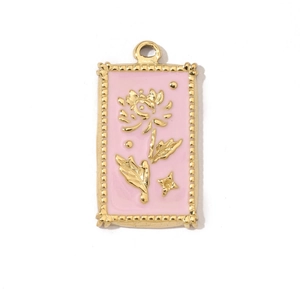 Detail of pink enamel flower pendant in gold stainless steel for jewelry making
