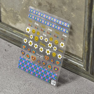 5D embossed nail stickers featuring colorful smiley faces, daisies and heart patterns