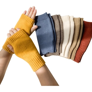 Knitted fingerless gloves for women in multiple colors including yellow, blue and gray