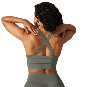 Olive green seamless yoga set featuring a cross-back sports bra and high-waist leggings