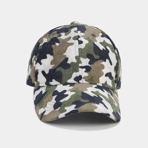 Detail of forest camouflage corduroy baseball cap with vertical ribbed fabric texture