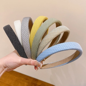 Pastel striped headbands set in six colors with woven texture and non-slip lining