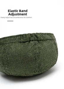 Detail of green herringbone newsboy cap featuring adjustable elastic band for comfort