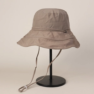 Side profile detail of a khaki quick-dry sun hat with wide brim and chin strap