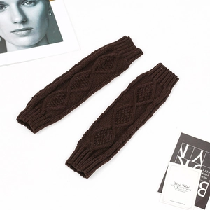 Detailed view of dark brown diamond knit arm warmers with thick ribbed elastic cuffs